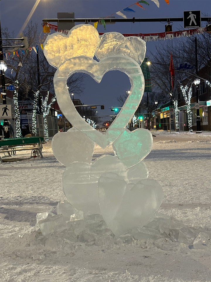 Interactive heart ice sculpture at a festival